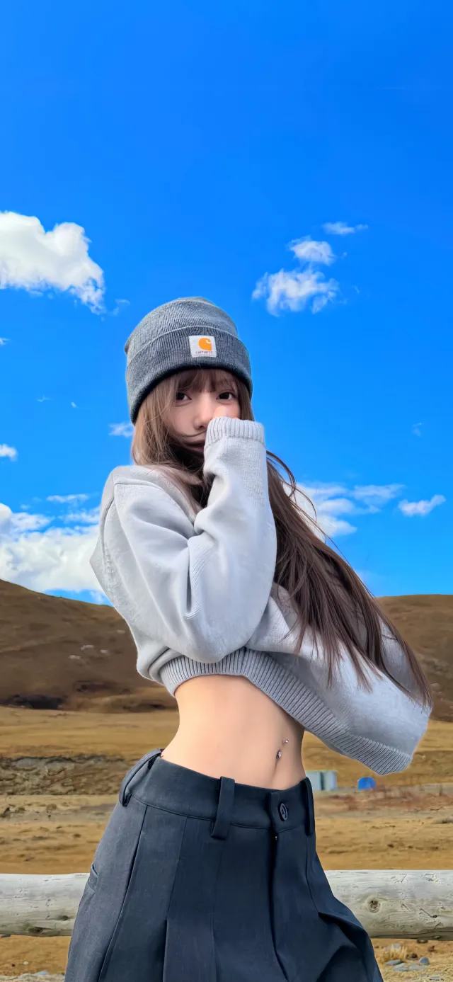 戴灰色针织帽女性户外写真人物手机壁纸