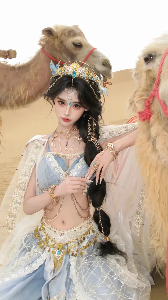 美女西域风骆驼伴身华丽服饰人物手机壁纸