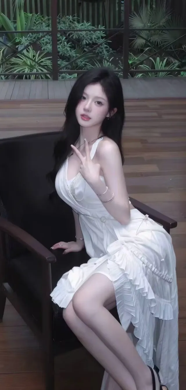 美女白裙比V手势绿植背景清新人像摄影人物手机壁纸