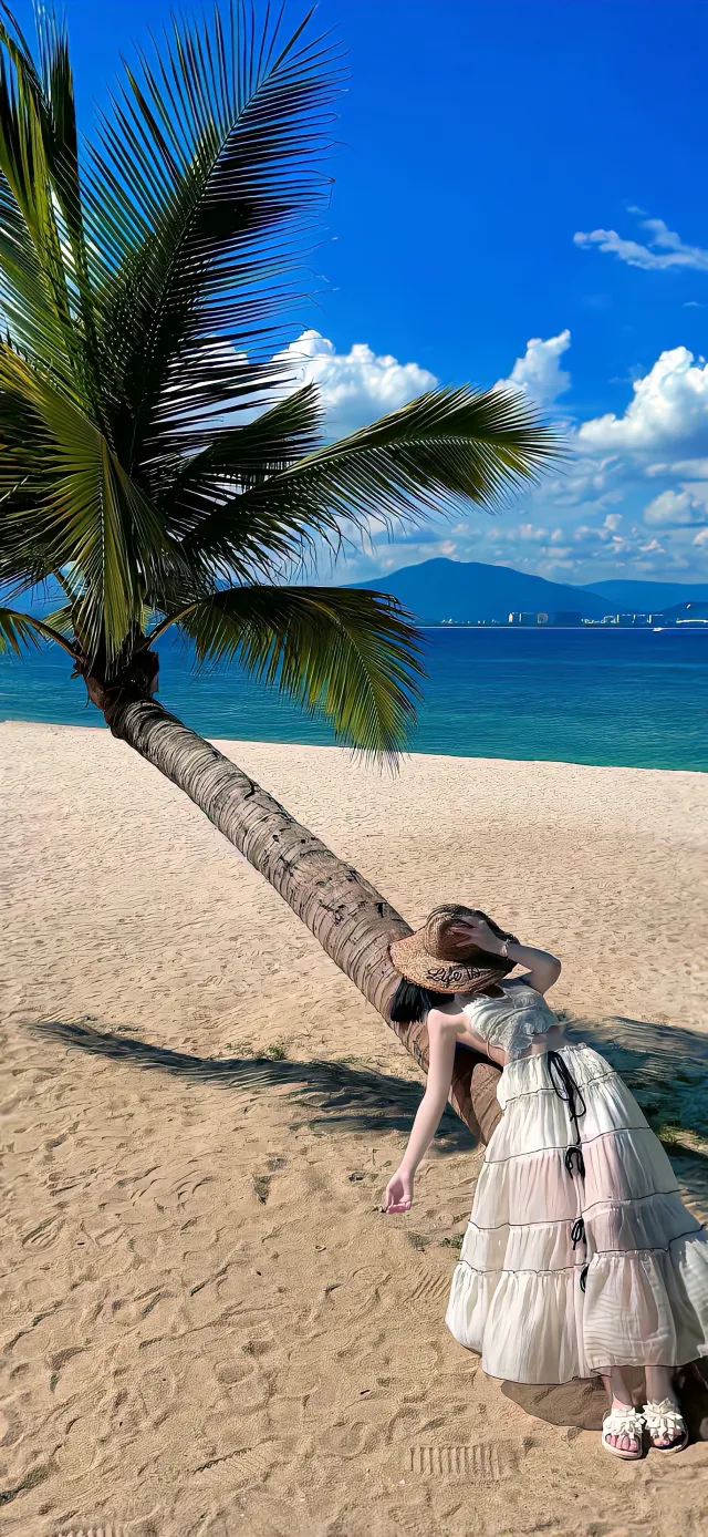 白裙美女椰树下海滩度假人物手机壁纸